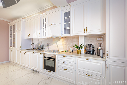 Image of Luxury modern white kitchen interior
