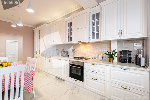 Image of Luxury modern white kitchen interior