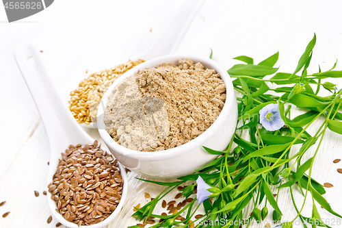 Image of Flour linen in bowl with seeds on board