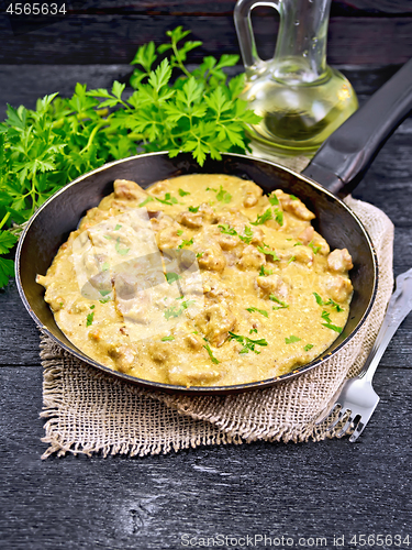 Image of Meat stewed with cream on burlap