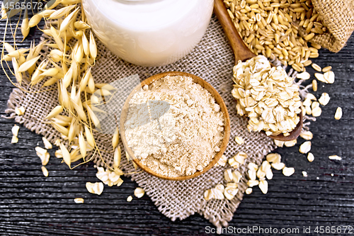 Image of Flour oat in bowl on dark board top