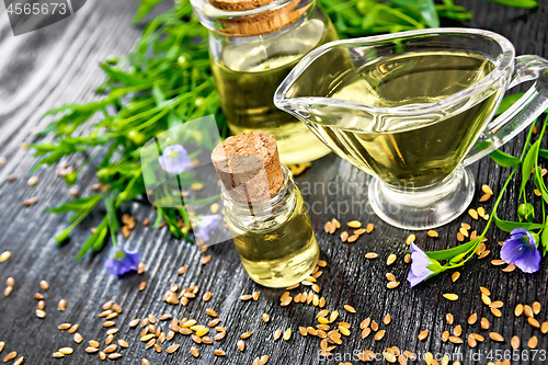 Image of Oil flaxseed with flowers on board