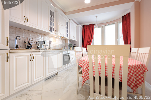 Image of Luxury modern white kitchen interior