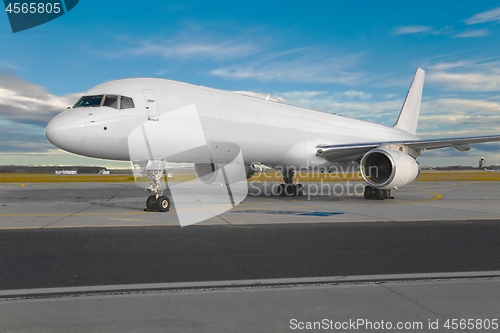 Image of Airliner on the ground, freighter plane with blank white paintwork