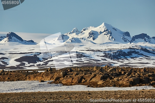 Image of Iceland landscape with snow on mountains