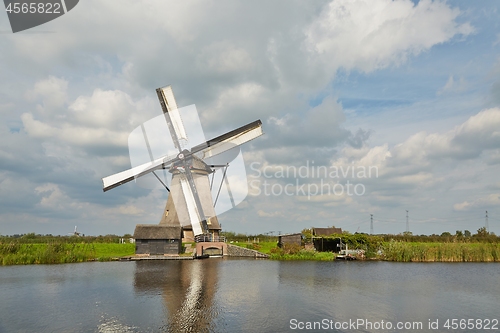 Image of Windmill beside a canal