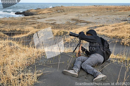 Image of Photographer in Iceland, black sand beach