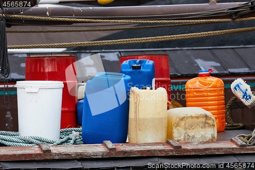 Image of Plastic cans of chemicals