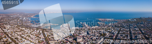 Image of Panorama of the city of Odessa and the sea with a port against a blue sky on a sunny day. Aerial view from the drone