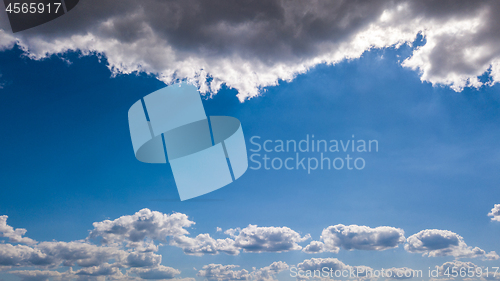 Image of Beautiful view of the blue sky with clouds and copy space. Natural background.