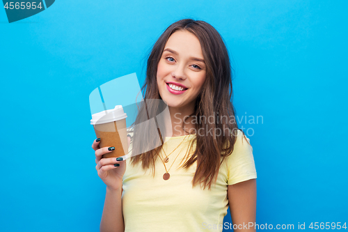 Image of young woman or teenage girl with coffee cup