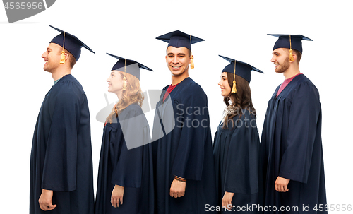 Image of graduates in mortar boards and bachelor gowns