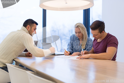 Image of Startup Business Team At A Meeting at modern office building