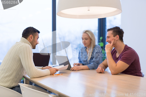 Image of Startup Business Team At A Meeting at modern office building