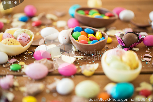 Image of chocolate easter eggs and candy drops on table