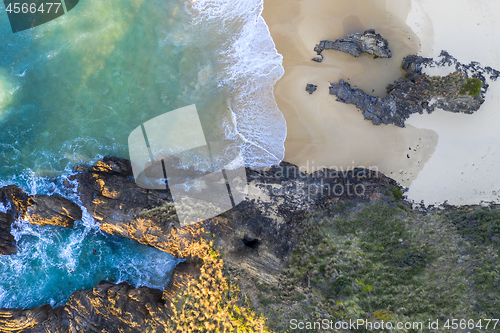 Image of Beach, water tunnel and secret window high in the cliff