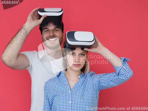 Image of happy couple using VR-headset glasses of virtual reality