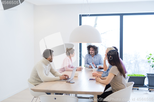 Image of Startup Business Team At A Meeting at modern office building