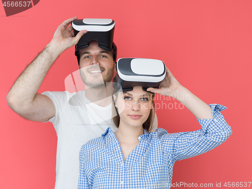 Image of happy couple using VR-headset glasses of virtual reality