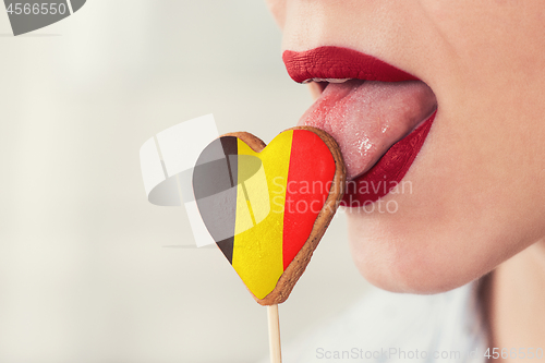 Image of Lips and cookie with flag