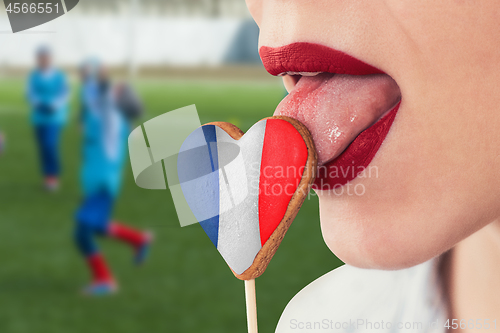 Image of Lips and cookie with flag