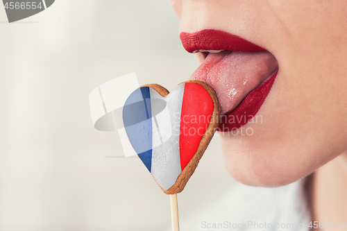 Image of Lips and cookie with flag
