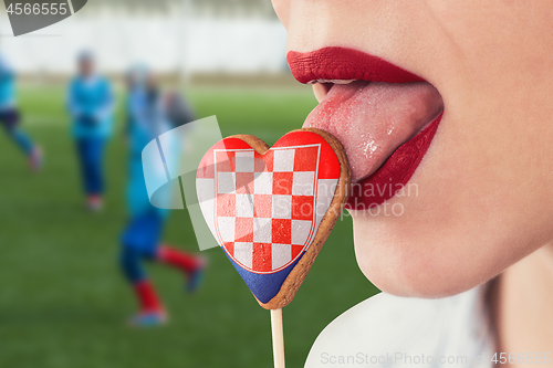 Image of Lips and cookie with flag