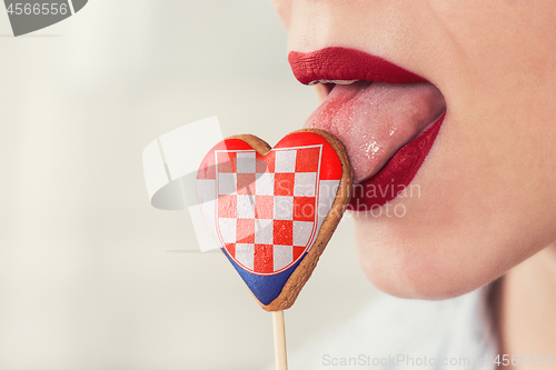 Image of Lips and cookie with flag