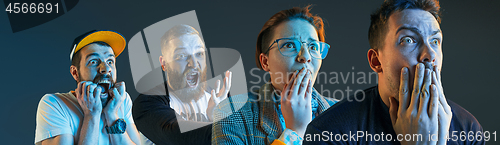 Image of The emotional angry men screaming on blue studio background