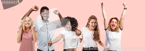 Image of Winning success man happy ecstatic celebrating being a winner. Dynamic energetic image of male model