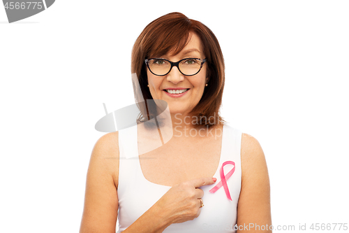 Image of old woman with pink breast cancer awareness ribbon