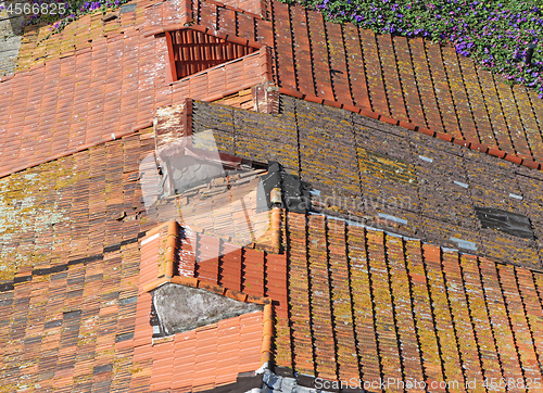 Image of Background of a roof with old roof tiles