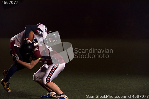 Image of American football players in action