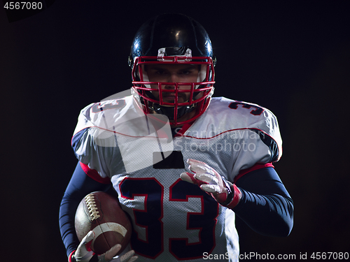 Image of portrait of confident American football player