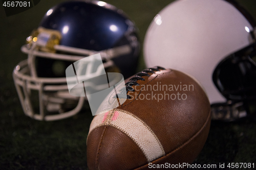 Image of american football and helmets