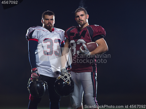 Image of portrait of confident American football players