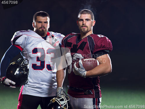 Image of portrait of confident American football players