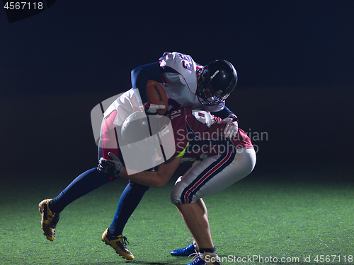 Image of American football players in action