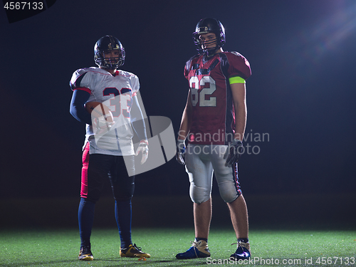 Image of portrait of confident American football players