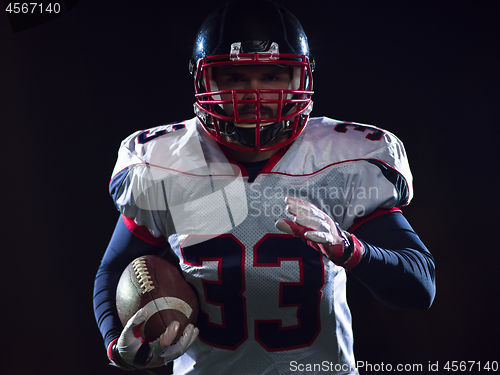 Image of portrait of confident American football player