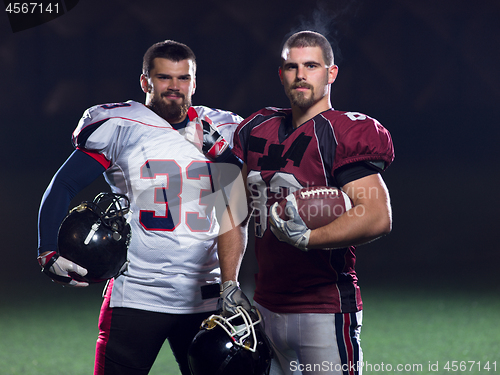 Image of portrait of confident American football players