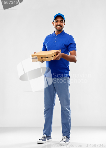 Image of happy indian delivery man with pizza boxes in blue