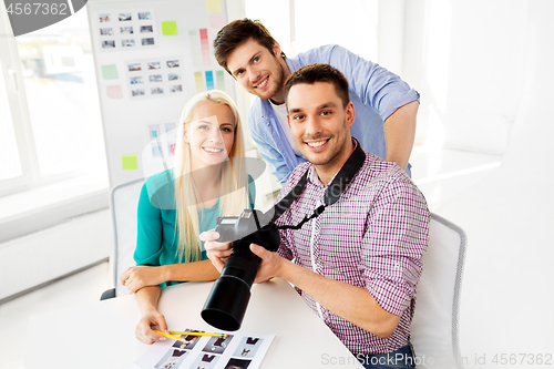 Image of photographers with camera at photo studio