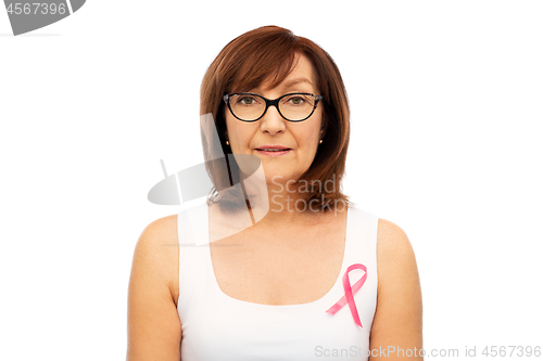 Image of old woman with pink breast cancer awareness ribbon