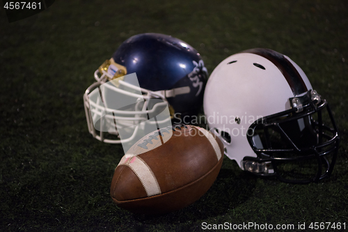 Image of american football and helmets