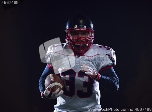 Image of portrait of confident American football player