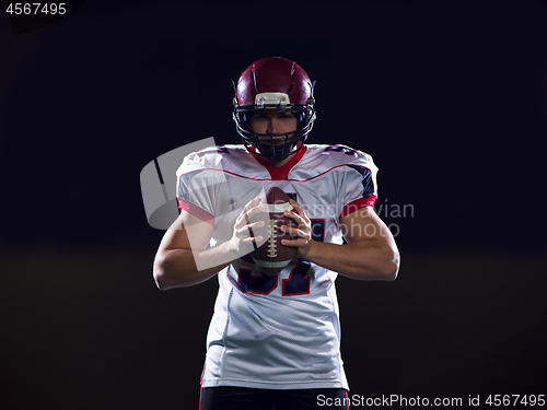 Image of portrait of confident American football player