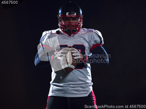 Image of portrait of confident American football player