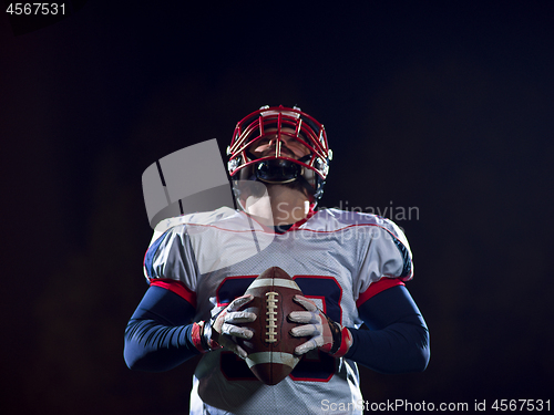 Image of portrait of confident American football player