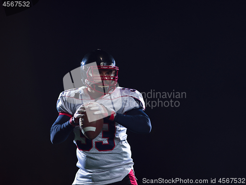 Image of american football player celebrating after scoring a touchdown